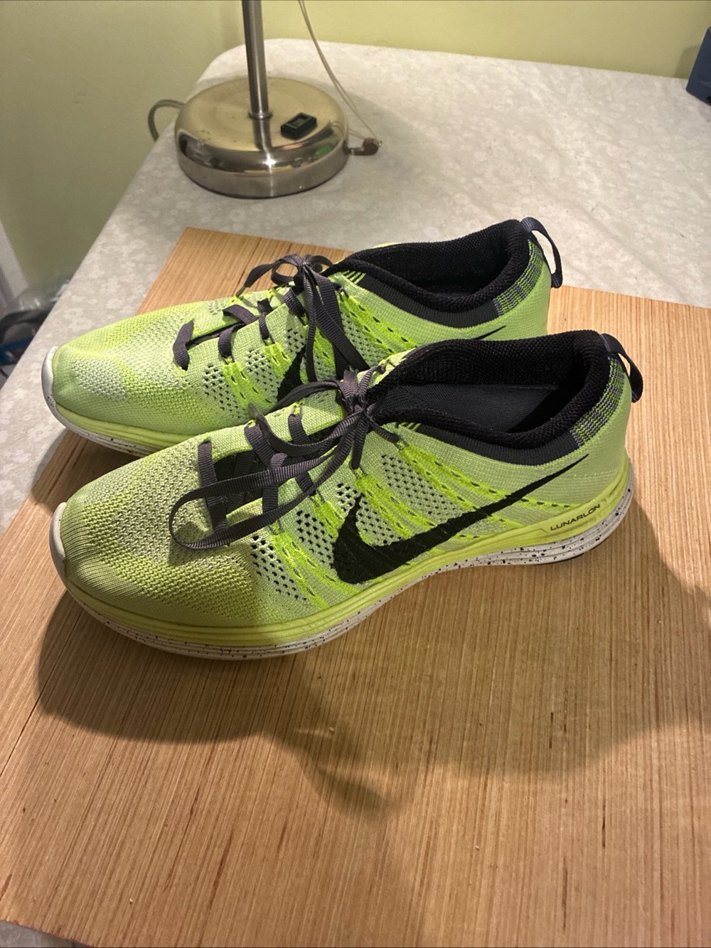 Nike Women’s Flyknit Lunarlon Running Shoes in Neon Yellow and Black